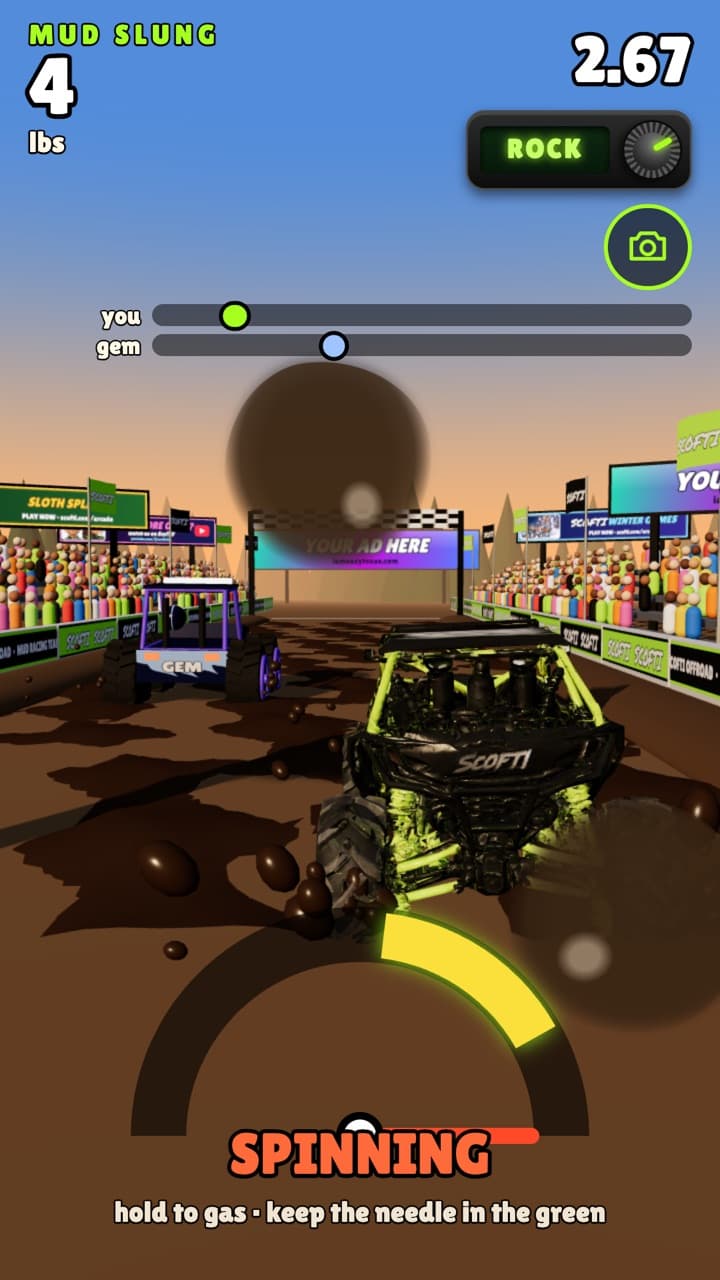 In the mud pit: the wheels are spinning, mud is flying and the throttle gauge is in the yellow.