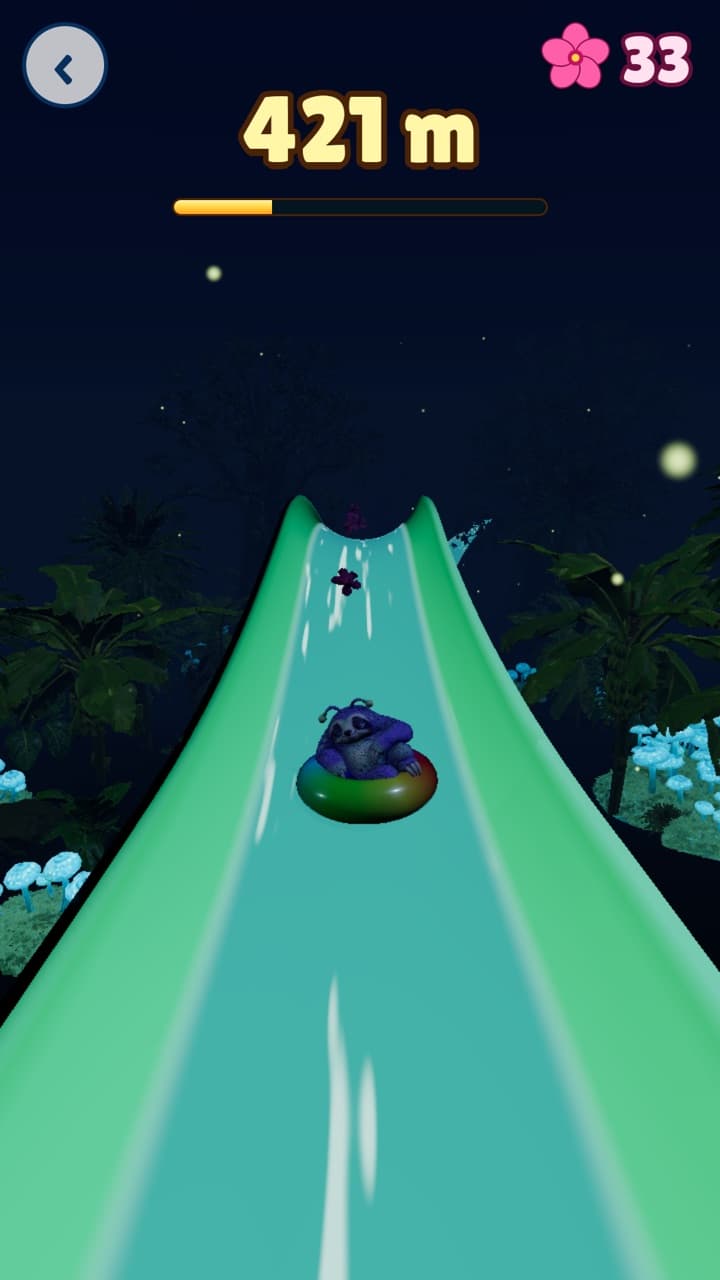 Noodles rides a green slide through Moonlit Jungle at night, 421 metres down.