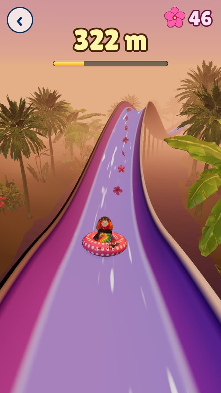 Trey rides a purple slide through Sunset River under a pink sky.